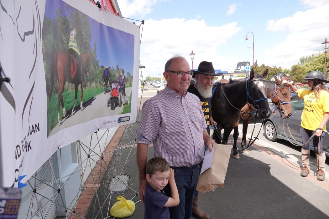 Rangitīkei MP Ian McKelvie accepts the petition from Arthur Yeo.