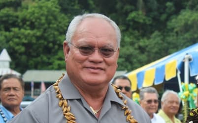 American Samoa Public Safety Commissioner Le'i Sonny Thompson, with Governor Lolo Malaga in cap
