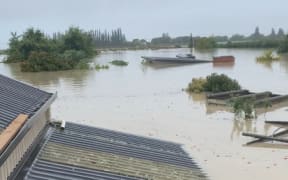 Wayne and Lynn Simpson smashed through the roof of their two-storey shed in Pakowhai to escape flooding, before they were rescued by helicopter and boat, during Cyclone Gabrielle.