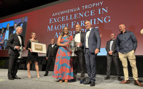 Hūhana Lyndon, Tama Potaka and Pita Morrison on stage at the Ahuwhenua Trophy 2025 award ceremony.