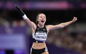 Anna Grimaldi of New Zealand celebrates after winning bronze during the Women's 100m T47 Final at the Paris 2024 Summer Paralympic Games.