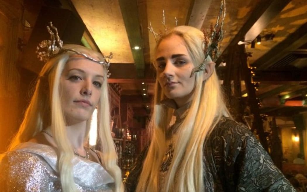 Fans in the UK celebrate at a party for the world premiere of The Battle of the Five Armies - the last Hobbit movie.