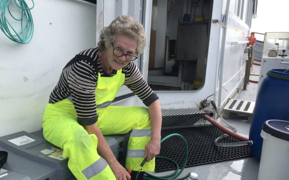 Dr. Kim Currie gets ready to collect another water sample.