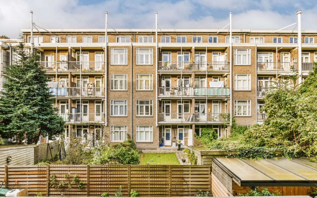 an apartment building with many windows and bales on the balconys in london, uk - stockfoorent com