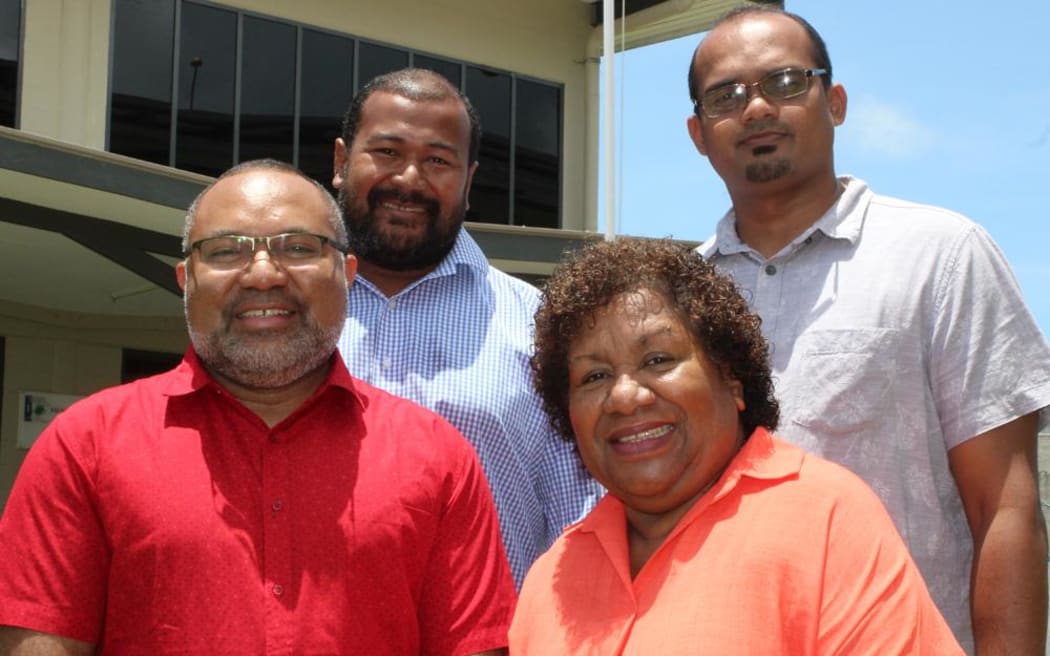 Donald Wilson (front, left)  with award recipients from the Fiji National University: Gade Waqa (front, right) and Sakiusa Baleivanualala and Atlesh Sudhakar (back row).