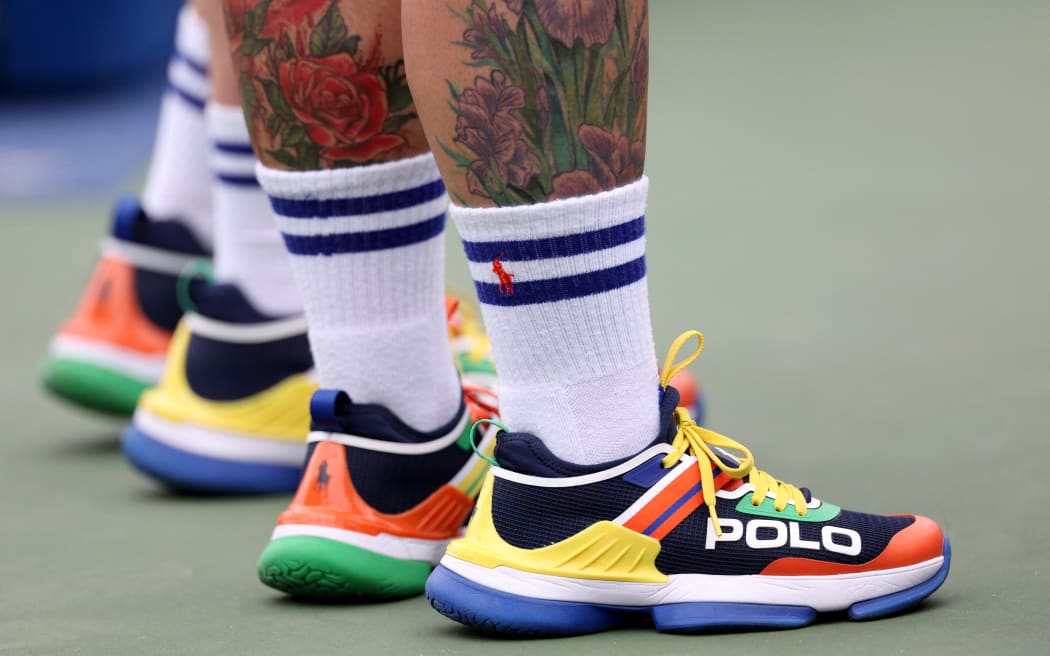 A detailed view of the US Open volunteers' shoes.