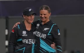 Suzie Bates (R) and Sophie Devine (L) of New Zealand celebrate their win over Pakistan at the 2024 T20 World Cup in UAE.