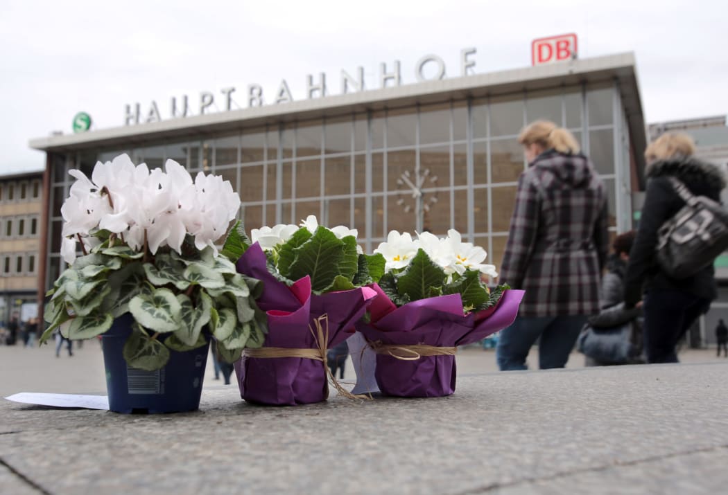 Flowers have been placed outside Cologne station, where the attacks happened.