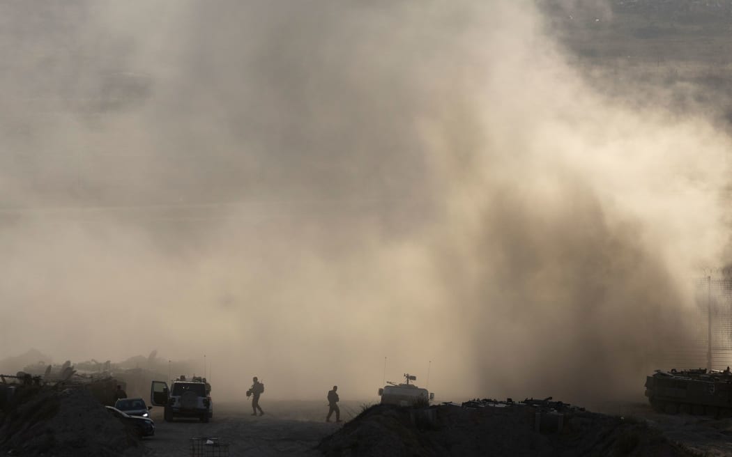Israeli soldiers near the border with Gaza on Wednesday. Prime Minister Benjamin Netanyahu said Israel intends to take military control of all of Gaza despite protests.
Mandatory Credit:	Amir Levy/Getty Images/File via CNN Newsource
