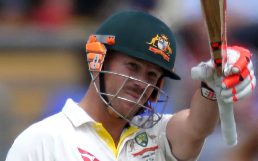 The Australia batsman David Warner celebrates his half century.