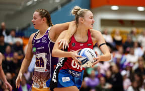 Monica Falkner of the Stars (L) and Carys Stythe of the Steel during their ANZ Premiership netball match.