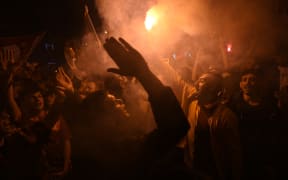 Galatasaray's supporters celebrate after a Turkish Super league football match between Ankaragucu and Galatasaray.