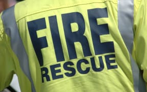 14915103 - fireman wearing a fire rescue jacket
