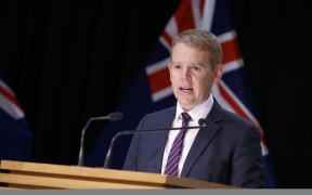 02032022 PHOTO: ROBERT KITCHIN/STUFF
L-R: 
Covid Response Minister Chris Hipkins delivers the Covid case numbers in the 1pm press conference in the Beehive Theatrette.