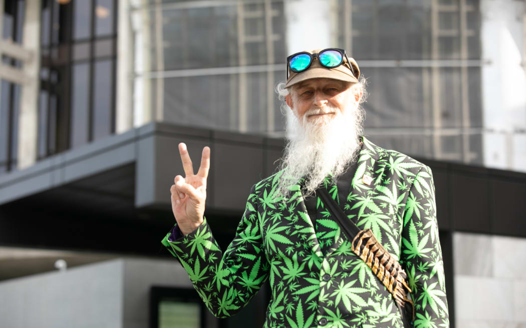 Drug reform advocate Gary Chiles stands outside Parliament buildings and in front of the Beehive. 6 April 2023.