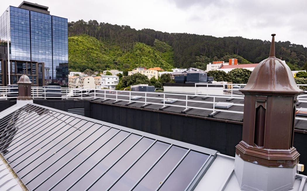 Crowning the glass roof of the Legislative Council Chamber are copper cupola vents - now purely decorative. As seen from the roof of Parliament House in Wellington. Tinakori Hill is in the distance.