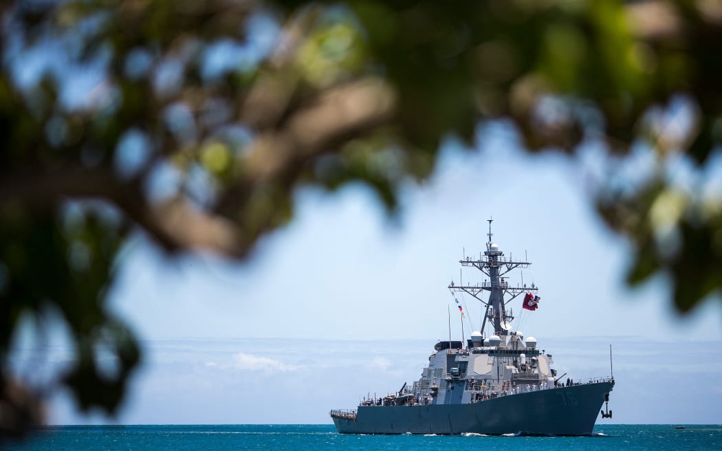 The USS Higgins sails into Joint Base Pearl Harbor-Hickam in support of Rim of the Pacific (RIMPAC) 2012 exercise on Friday, June 29, 2012 in Pearl Harbor, Hawaii.  Twenty-two nations, 42 ships, six submarines, more than 200 aircraft and 25,000 personnel will participate in the biennial RIMPAC exercise from June 29 to August 3, in and around the Hawaiian Islands.  AFP PHOTO / Kent NISHIMURA (Photo by Kent Nishimura / AFP)