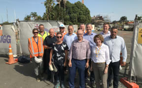 Infrastructure New Zealand leaders and sector participants about to look over the Hundertwasser Art Centre.