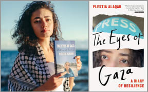 Image of Plestia holding her book.