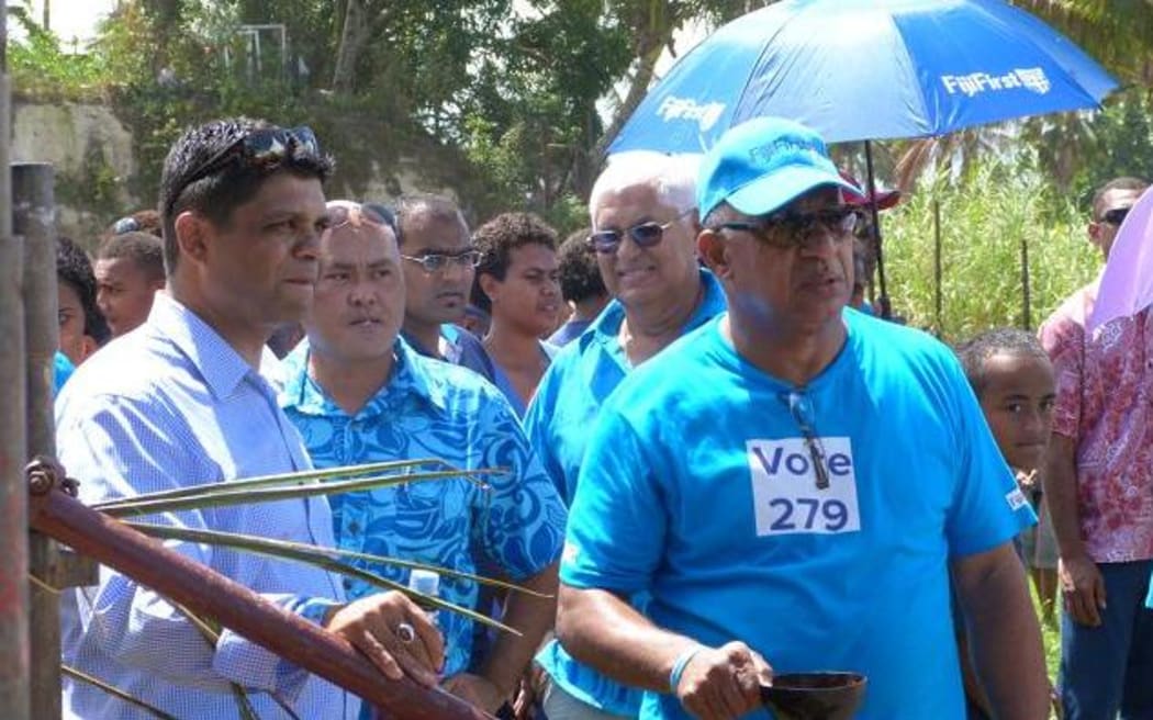 FijiFirst candidates Aiyaz Sayed-Khaiyum and Rear Admiral Frank Bainimarama