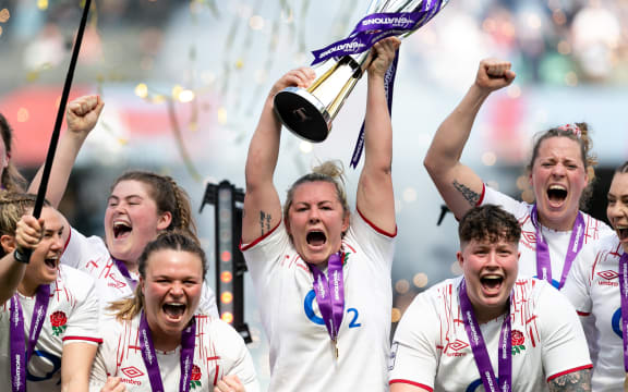 England captain Marlie Packer lifts the Six Nations trophy