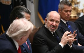 US Secretary of Commerce Howard Lutnick (3L) speaks as President Donald Trump (L) hosts a cabinet meeting in the Cabinet Room of the White House in Washington, DC, on January 29, 2026. (Photo by Brendan SMIALOWSKI / AFP)