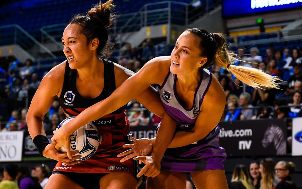 Erikana Pedersen of the Tactix and Courtney Tairi of the Northern Stars battle for the ball.