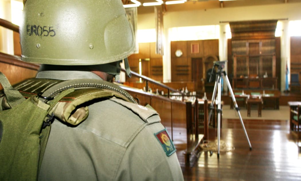 Media censorship was tightened in Fiji after military leader Frank Bainimarama staged a bloodless coup in December 2006 when this photo was taken. It shows a soldier after troops cleared senators and media from the debating chamber as the armed closed down Fiji's parliament.