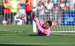 Wellington Phoenix's Josh Oluwayemi saves a penalty.