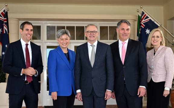Australia's new Prime Minister Anthony Albanese poses for pictures with his new cabinet ministers, Jim Chalmers, Penny Wong, Richard Marles and Katy Gallagher after the oath taking ceremony at Government House in Canberra on 23 May, 2022.
