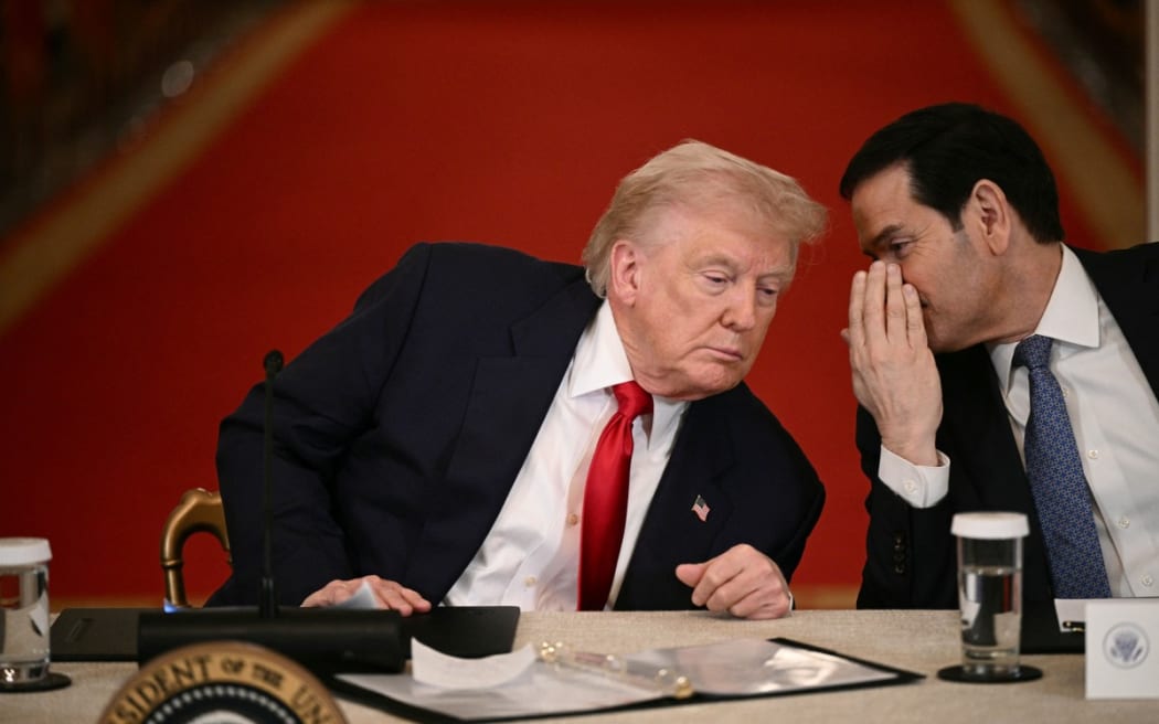 US President Donald Trump and Secretary of State Marco Rubio speak during a roundtable at the White House in Washington, DC, on 6 March, 2026.