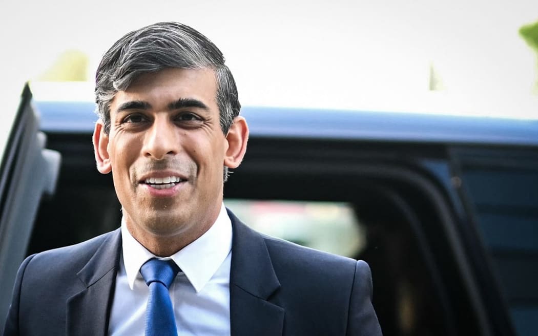 Britain's Prime Minister and Conservative Party leader Rishi Sunak arrives at the ITV studio, at the Media City, in Salford, northern England, on June 4, 2024, to attend the first live TV debate for the general election campaign. (Photo by Oli SCARFF / AFP)