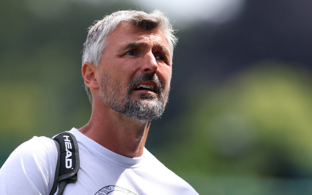 25th June 2022, All England Lawn Tennis and Croquet Club, London, England;  Wimbledon Tennis tournament; Novak Djokovic's coach Goran Ivanisevic leaves the court after the session