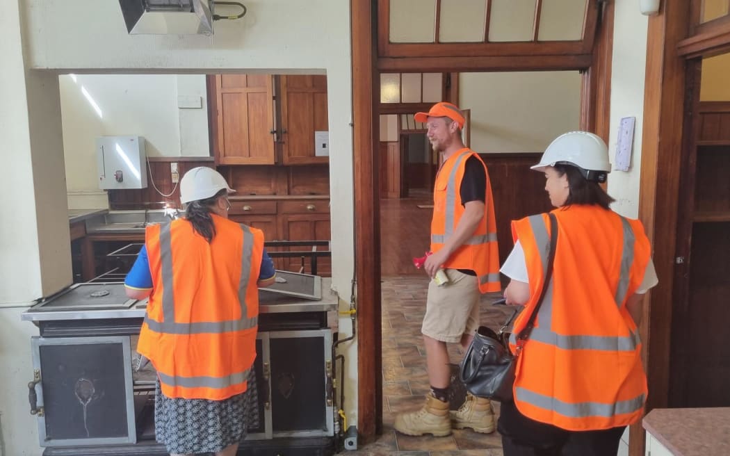 ARC chief executive Thomas Bishop takes staff from Te Oranganui Trust through St George's.