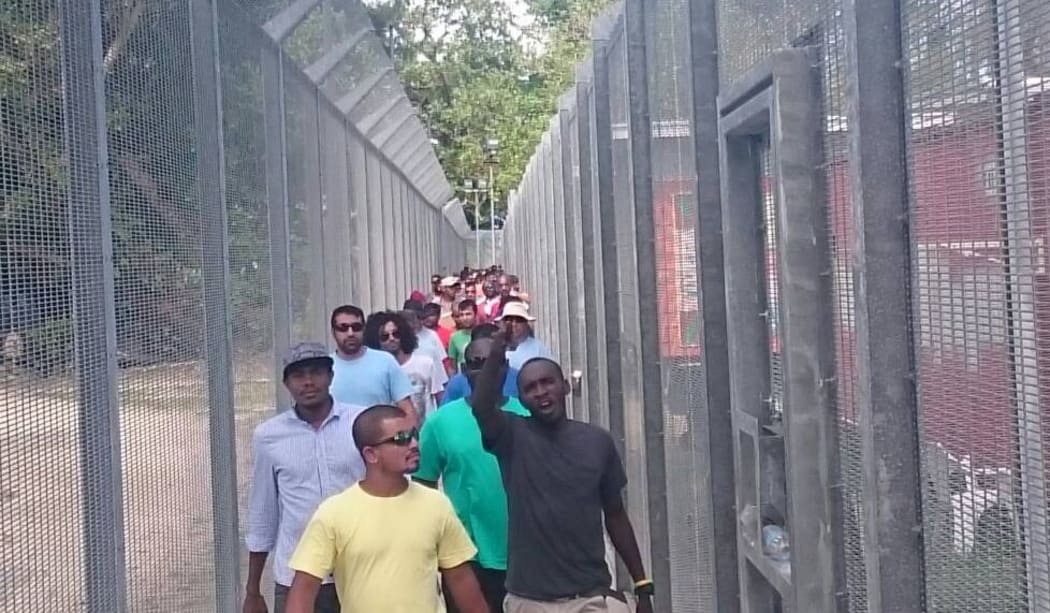Refugees gather for the 60th day of protest on Manus Island.