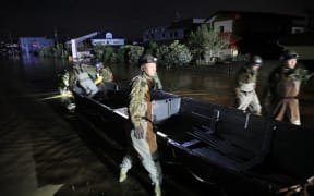 Self-Defense Forces Personnel conduct rescue operation at area flooded by the Chikuma river overflown in Nagano City, Nagano prefecture on Oct. 13, 2019, one day after Typhoon No. 19, known as Typhoon Hagibis, a powerful super typhoon, made a landfall.