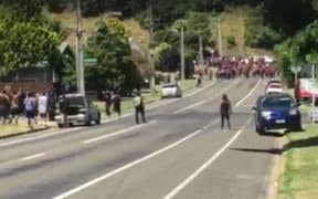 Shots have been fired in Whakatane, where a gang funeral is being held, and several arrests have been made, police say.