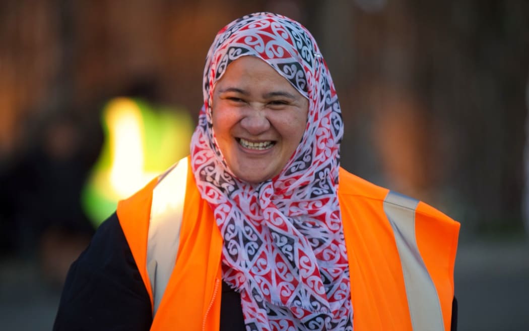 People gathering Thursday morning are greeted by the hundreds of smiling volunteers like Tui at the tangi for Kiingi Tuheitia Pootatau Te Wherowhero VII.