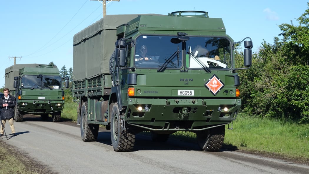 Defence Force trucks, carrying supplies, head for Kaikoura.