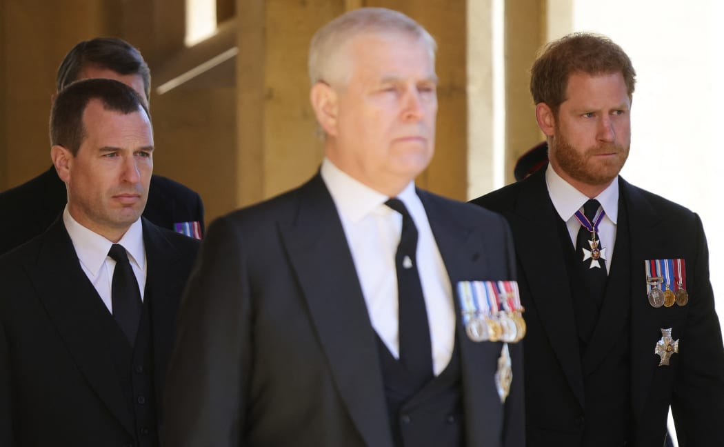 Prince Andrew and Prince Harry leave the chapel after the service