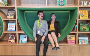 Marlborough District Council Libraries manager Glenn Webster and mayor Nadine Taylor in a reading nook at the new Blenheim Library