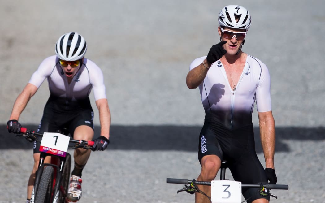 Sam Gaze (right) takes gold and Anton Cooper win silver in the men's mountain-biking competition at the 2018 Commonwealth Games.