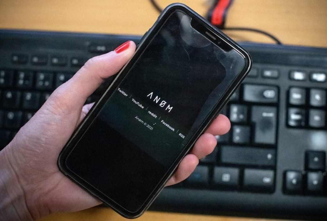 ANoM logo on phone