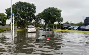 Flooded street in Greenlane, Auckland, on Monday 21 March 2022.