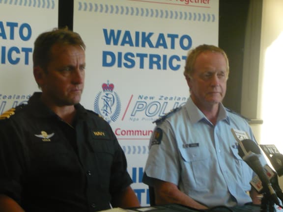 Navy Lieutenant Commander Trevor Leslie and Inspector John Kelly at Sunday's news conference in Raglan.