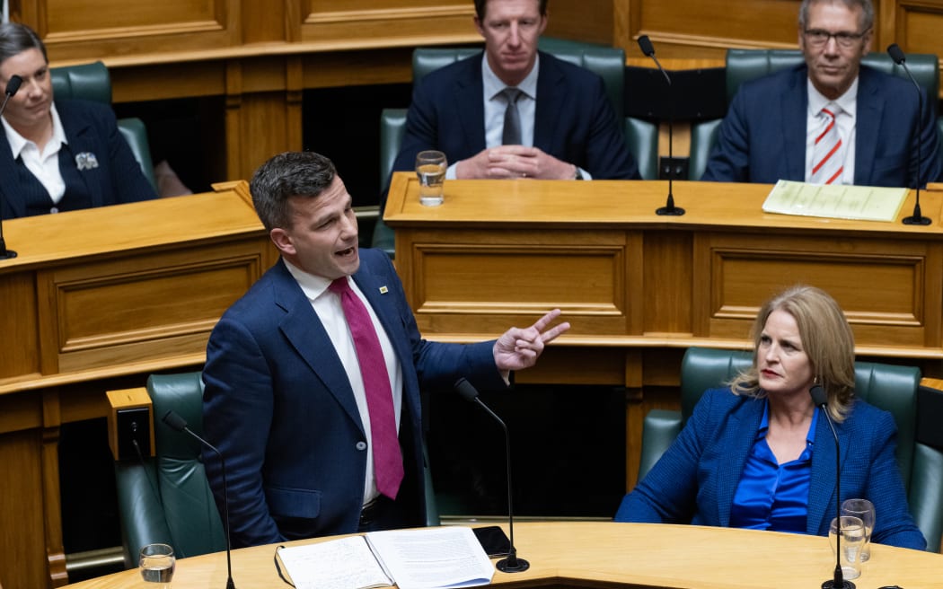 Photos can catch inaccurate but fun moments. ACT leader David Seymour is actually counting off his debating points, not gesticulating in the direction of his bench-mate, National's Louise Upston.