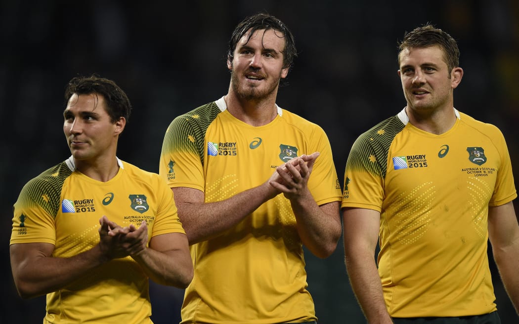 Australia lock Kane Douglas (C) celebrates after getting out of jail in the quarter-final against Scotland at the 2015 Rugby World Cup, Twickenham, London, on October 18, 2015. AFP PHOTO / MARTIN BUREAU
