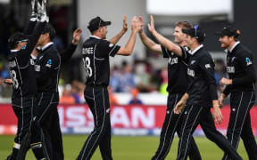 NZ players celebrate the wicket of Morgan.
ICC Cricket World Cup FINAL.