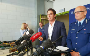 Police Minister Stuart Nash (third left) and Deputy Police Commissioner Mike Clement (right) at a media briefing held at the end of the gun buy-back scheme.