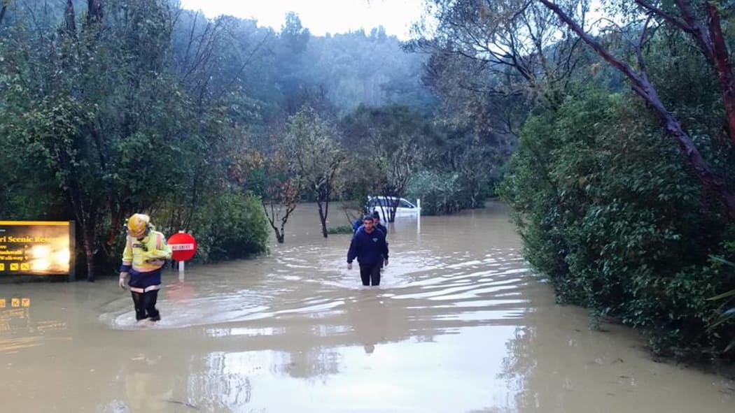 Firefighters from Te Kuiti's volunteer brigade rescued people stuck in a car in flooding at Tumutumu Road, near Waitomo.
